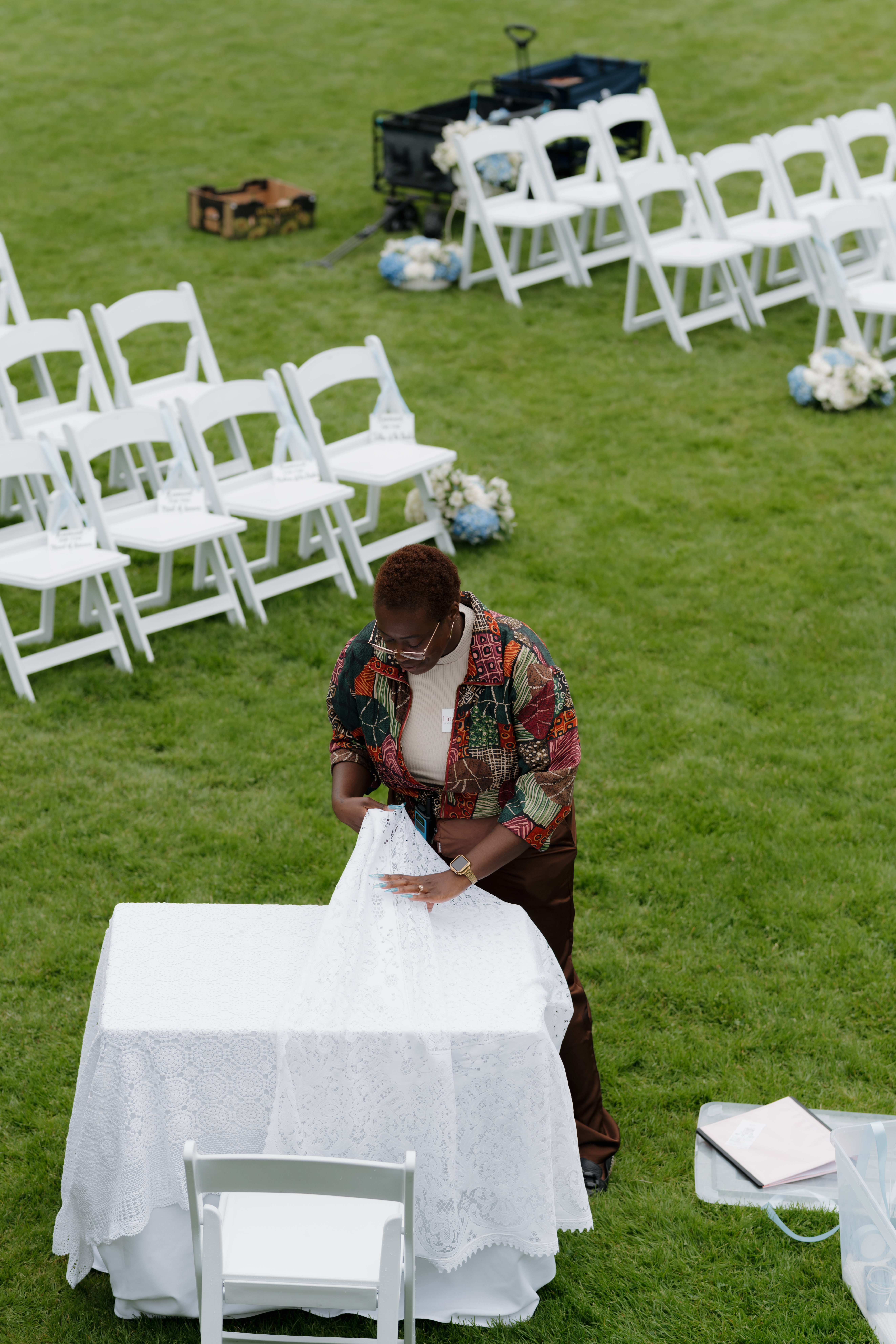 Linda from Fêtes by Linda setting up a wedding in Victoria BC, showing the hands-on difference a wedding coordinator makes compared to a venue coordinator.